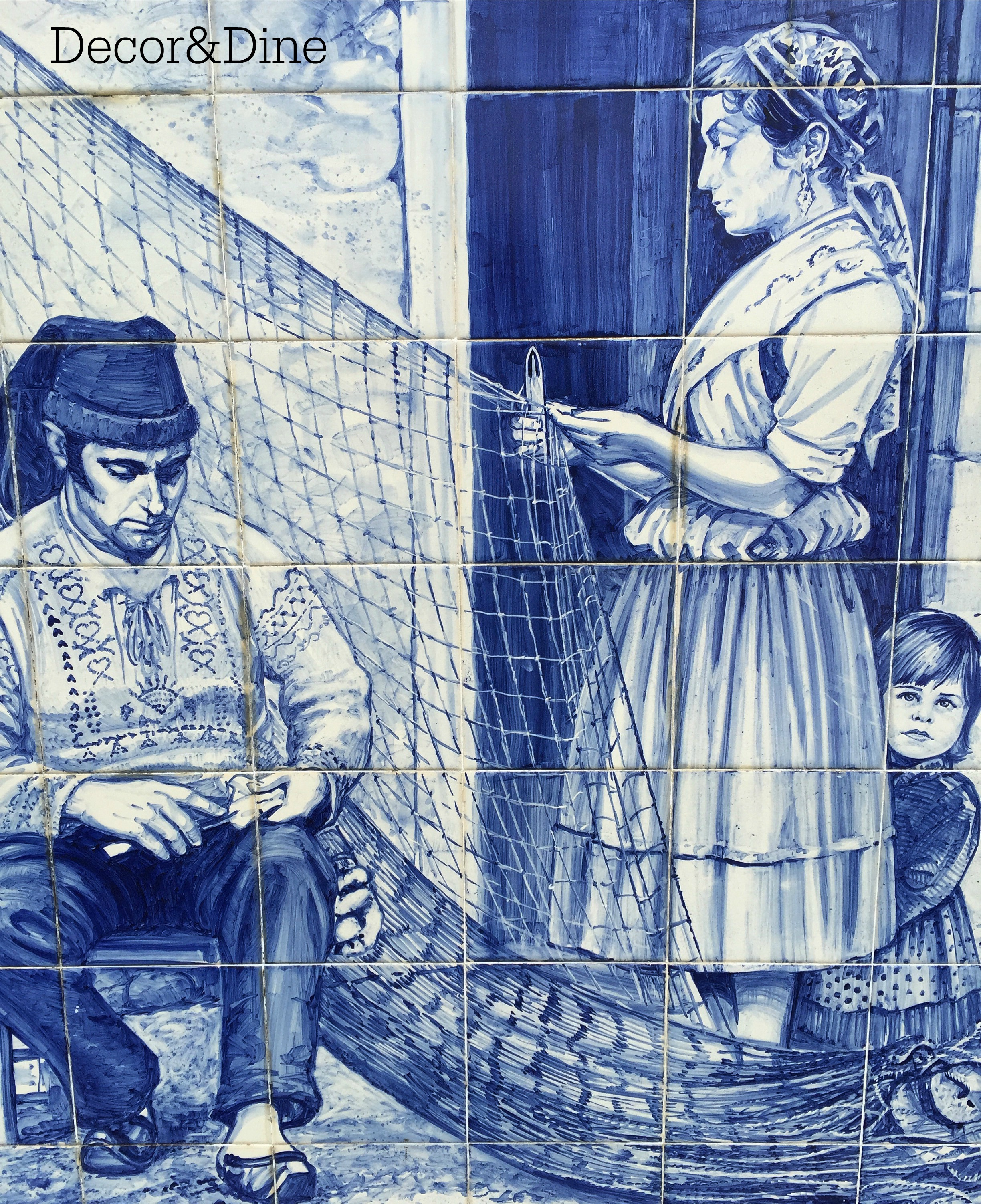 Azulejo mural of man, woman and child.