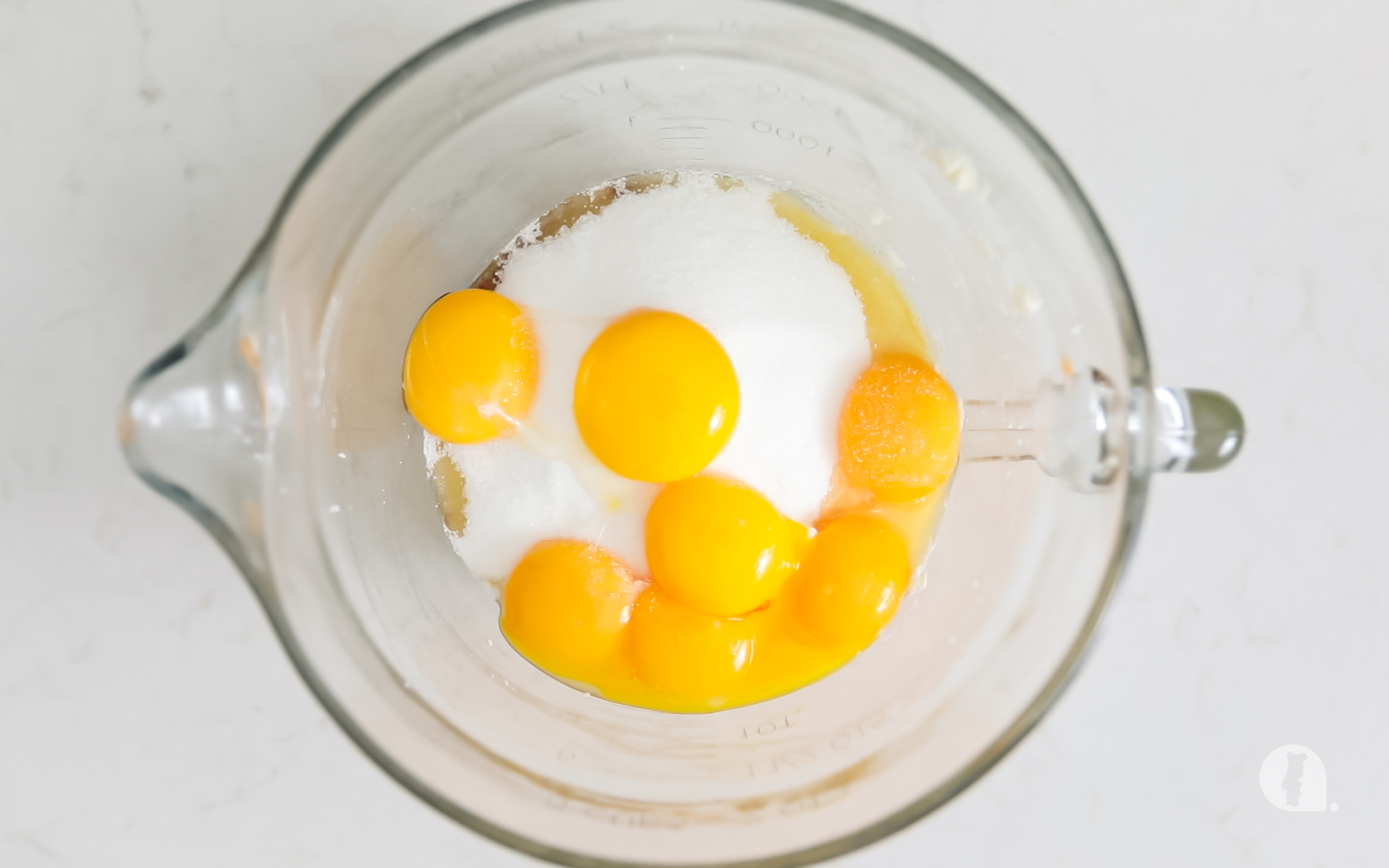 Eggs, sugar, butter, flour and cinnamon added to the bowl with the fresh cheese.